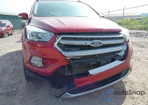 2017 Ford Escape Titanium z USA, uszkodzony, nr VIN 1FMCU9J99HUC41851